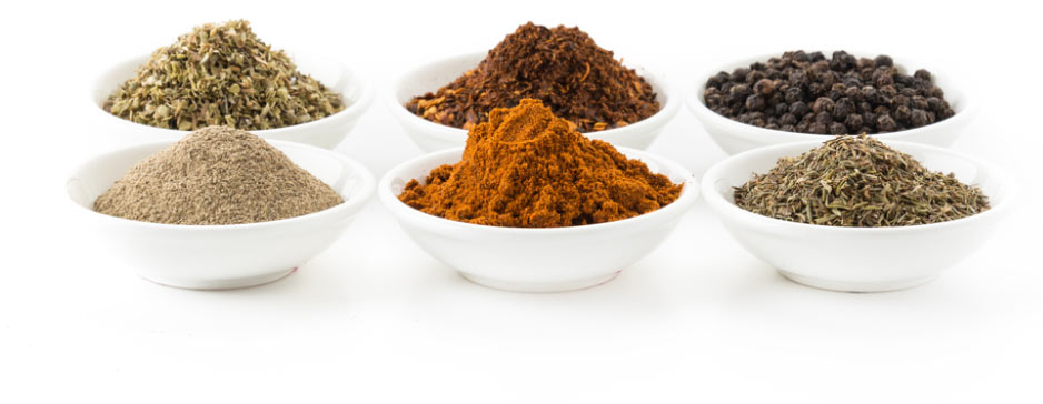 A collection of spices in small bowls A collection of spices in small bowls