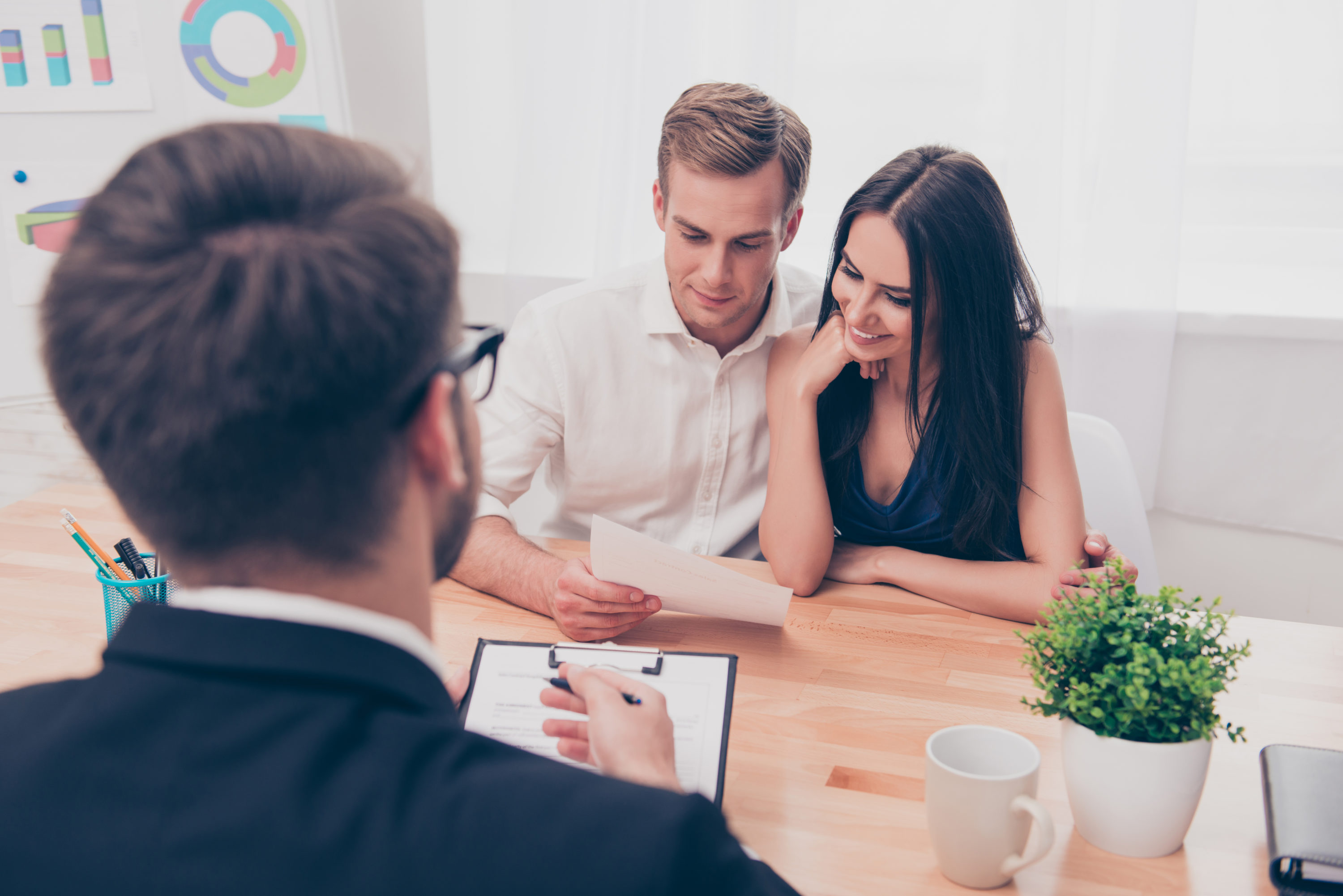 Young couple reviewing a document